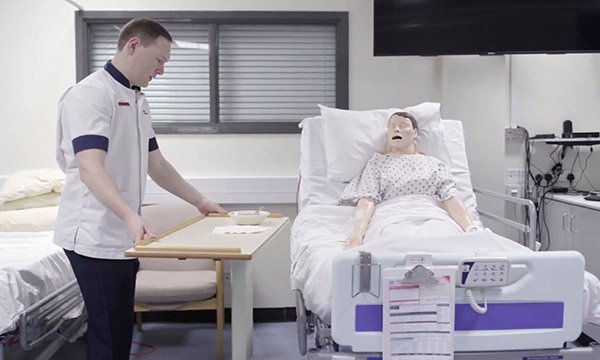 A scene from the video Men in Nursing